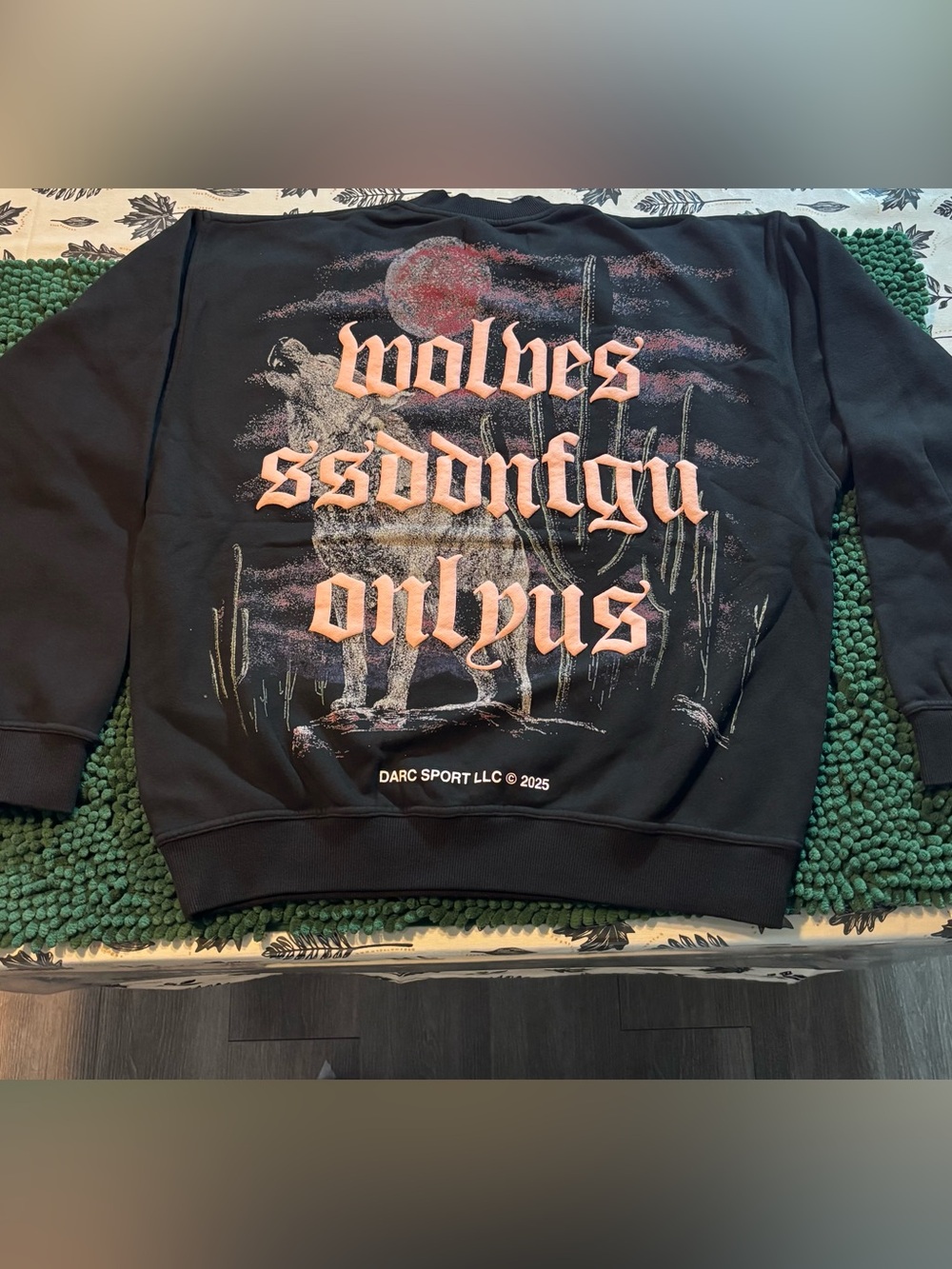 Darc Sport Black Crewneck Sweatshirt with Peach Graphic Wolves